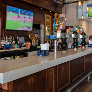 Ropewalk indoor bar with flatscreen TV showing a baseball game