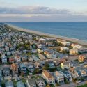 aerial view of bethany beach delaware with beach and houses