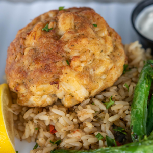Ropewalk crabcake entre with brown rice and green beans